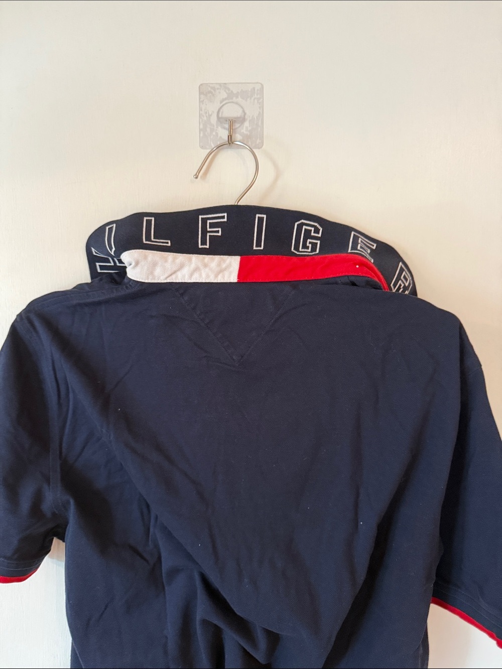 Tommy Hilfiger Navy Polo with Red Sleeve Trim Cotton Spell out | Men's Large